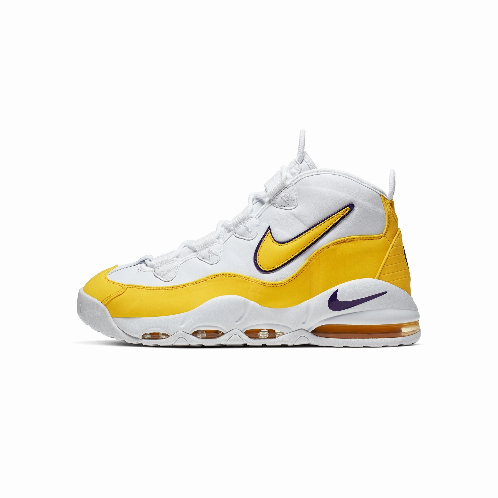 zipper running in a wooden bridge area shoes Nike Mens Air Max Uptempo 95 Shoes