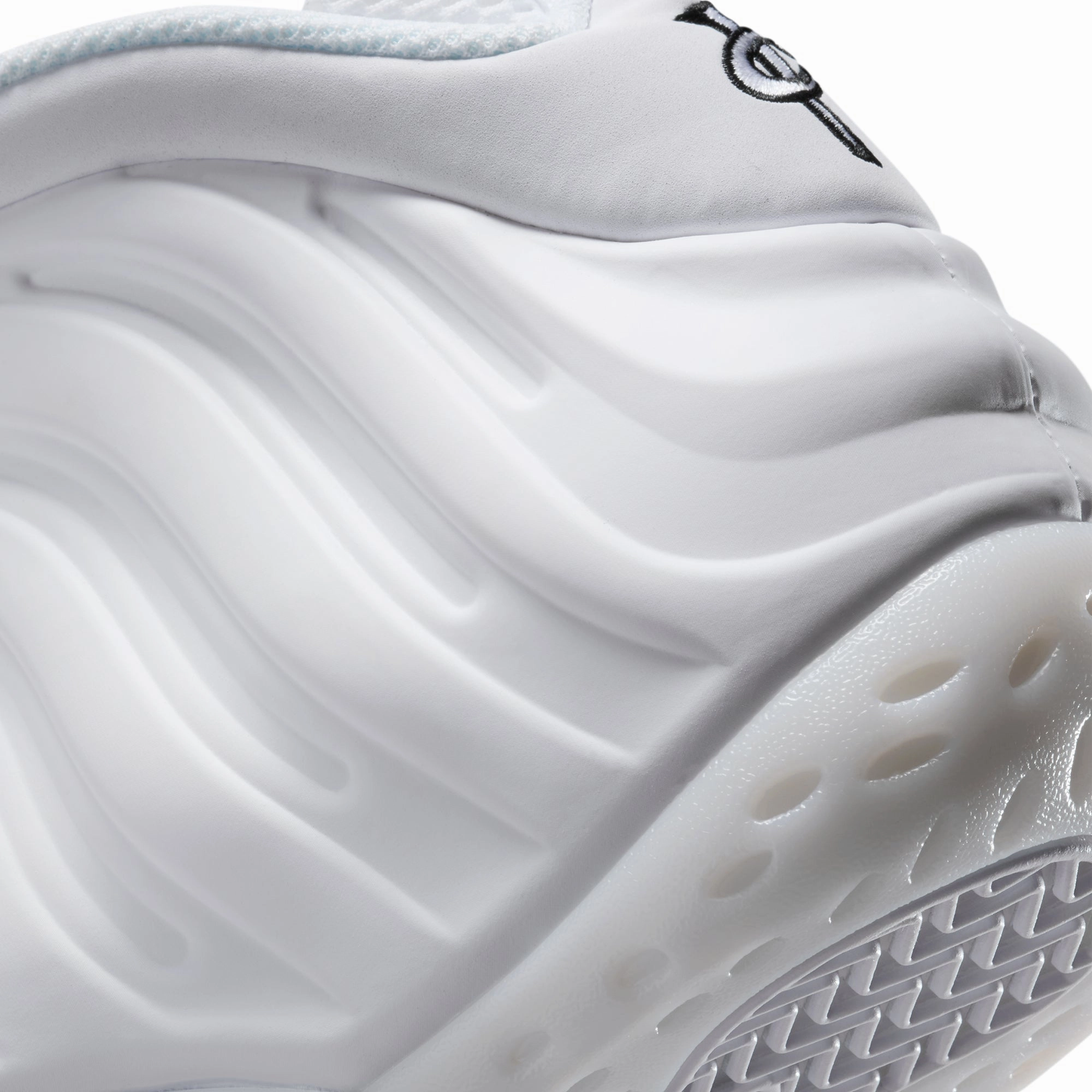 Nike Mens Air Foamposite One Shoes running with a hat