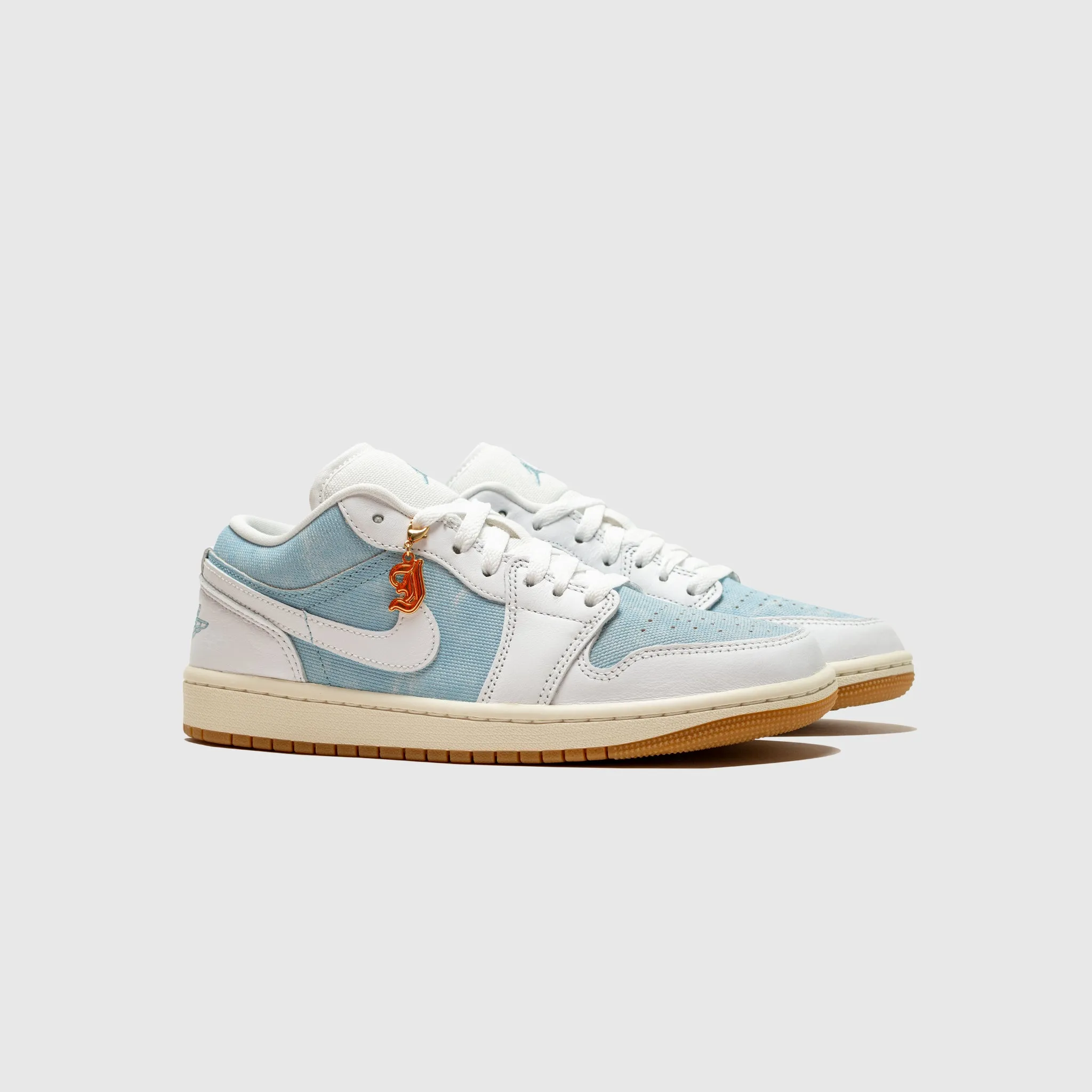 WMNS AIR JORDAN 1 LOW SE "WORN BLUE" running in a ravine area shoes balance and coordination running shoe help