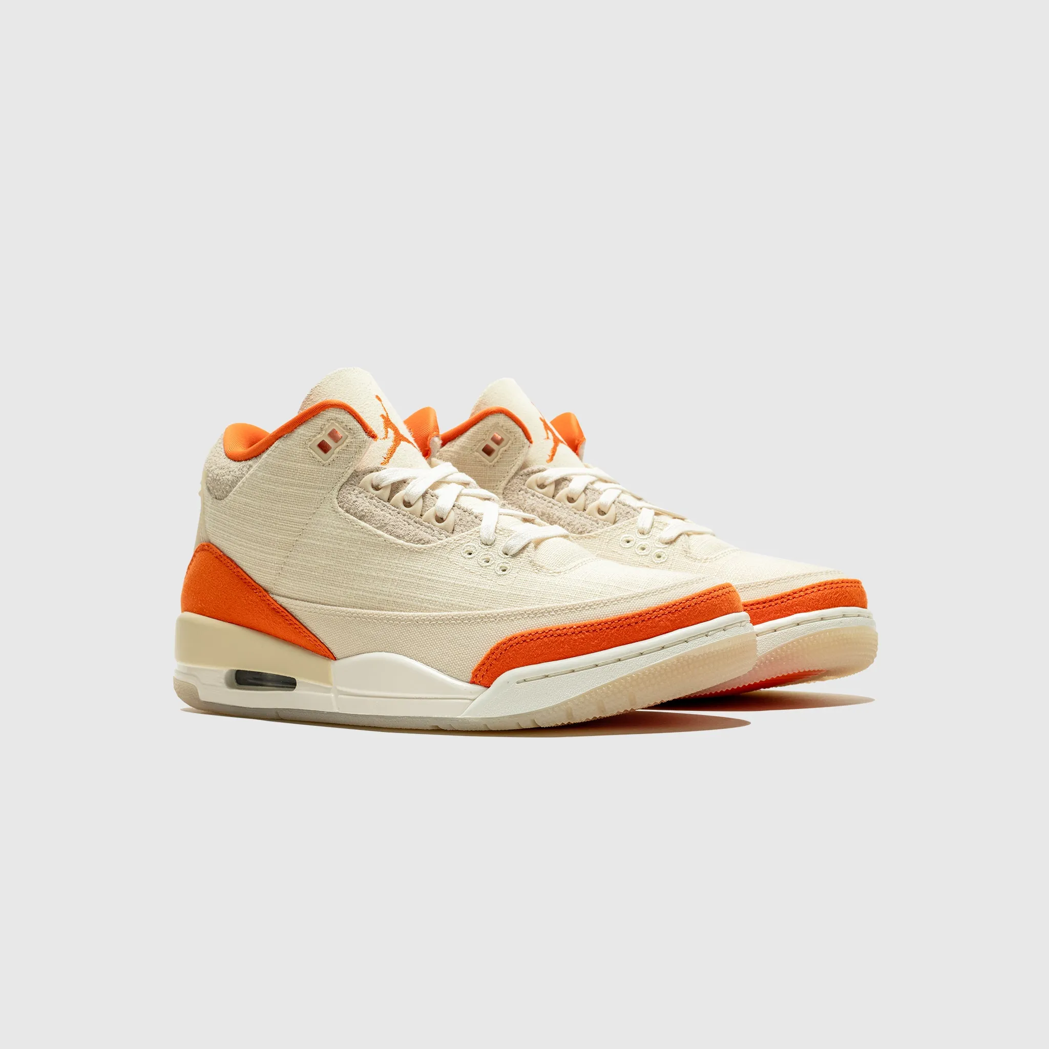 WMNS AIR JORDAN 3 RETRO "STARFISH" Comfort Shock running in a community park shoes